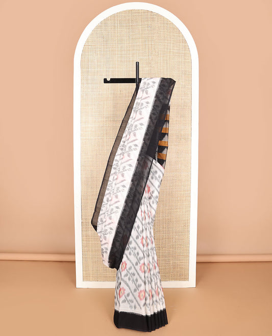 White floral design ikkat cotton saree with contrast border & geometric design pallu