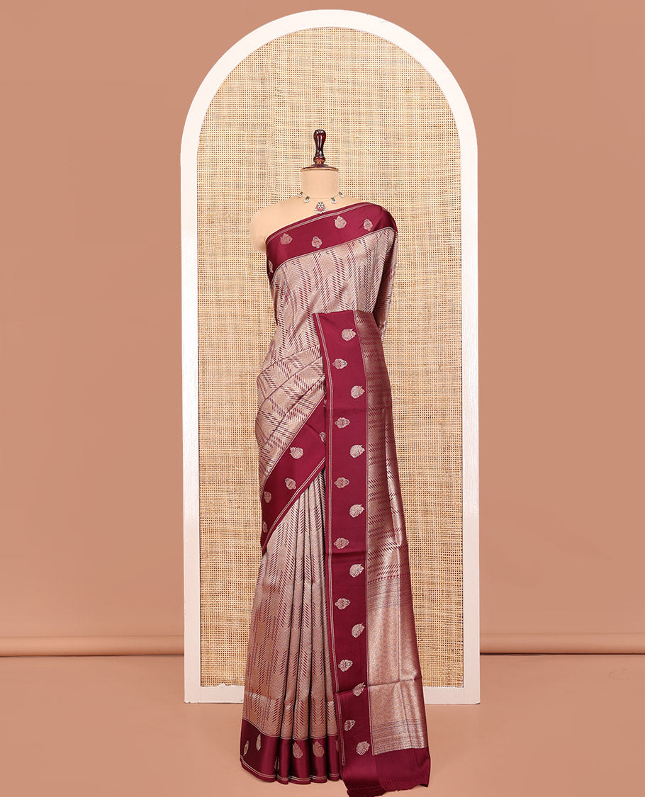 Magenta Pink Russian Dola Silk Saree, Gracefully Embellished with Zari Zig-Zag Jacquard on Its Body, Highlighted by Zari Buttas Woven Satin Border, Intricately Designed Pallu, and Paired with a Matching Blouse