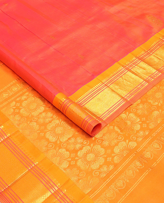 Orange zari buttas kanchipuram silksaree, contrast one-sided border of paneer sombu,banaras,muthu & jaal & floral design pallu