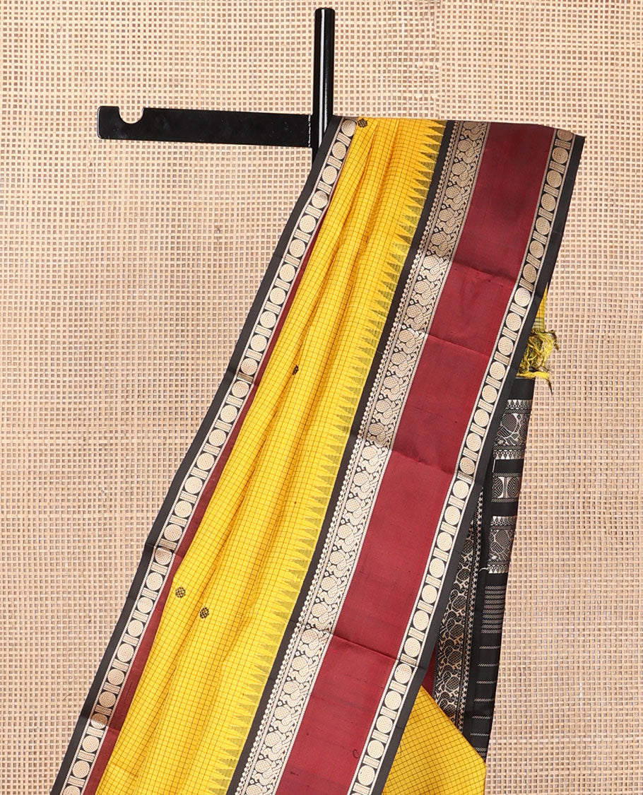 Yellow micro-checked & buttas kanchipuram silk saree, contrast rettai pettu border of salngai,banaras,mayil & rudraksham & seppu rekku pallu