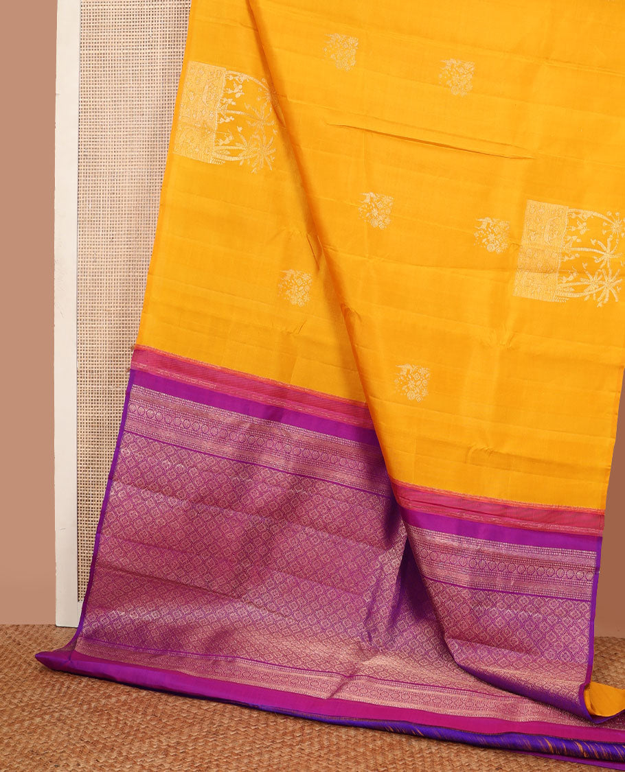 Borderless yellow warli-Island-theme woven zari buttas Kanchipuram silk saree, contrast jaal pallu