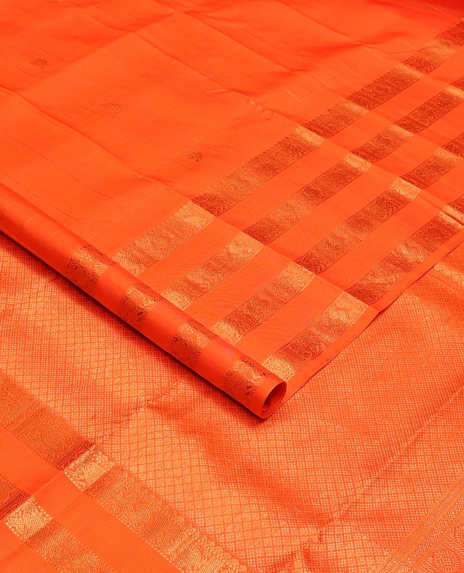 Orange zari buttas Kanchipuram silks saree, zari border of thilakam, muthu, yaanai, mayil, and kuthirai, and jaal pallu