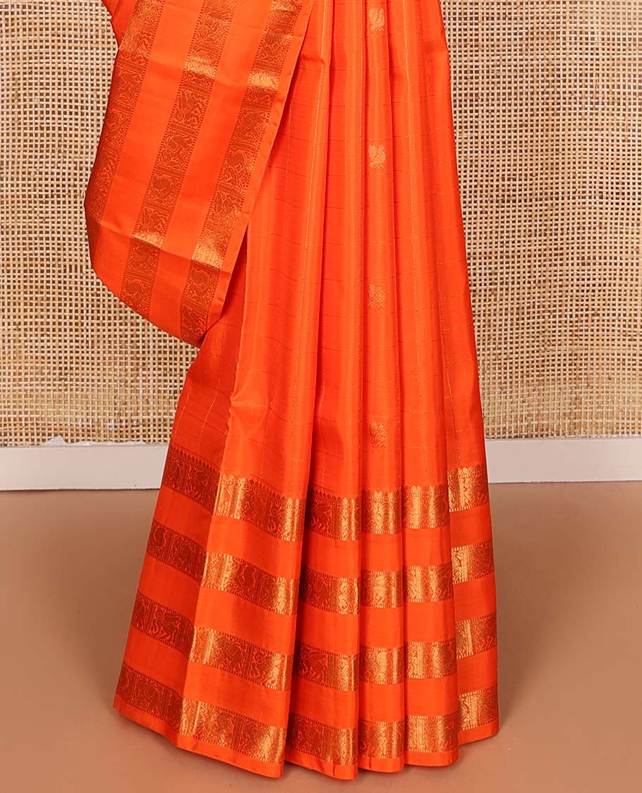 Orange zari buttas Kanchipuram silks saree, zari border of thilakam, muthu, yaanai, mayil, and kuthirai, and jaal pallu