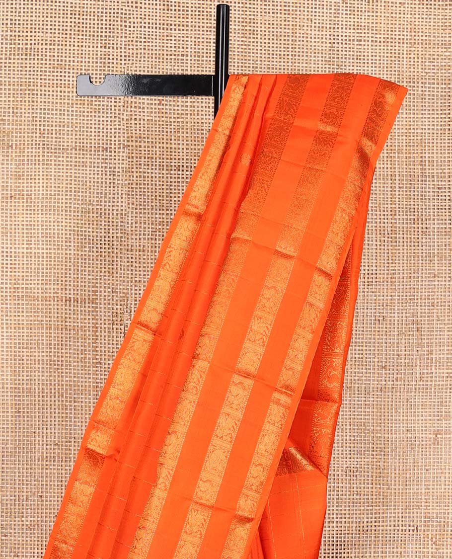 Orange zari buttas Kanchipuram silks saree, zari border of thilakam, muthu, yaanai, mayil, and kuthirai, and jaal pallu