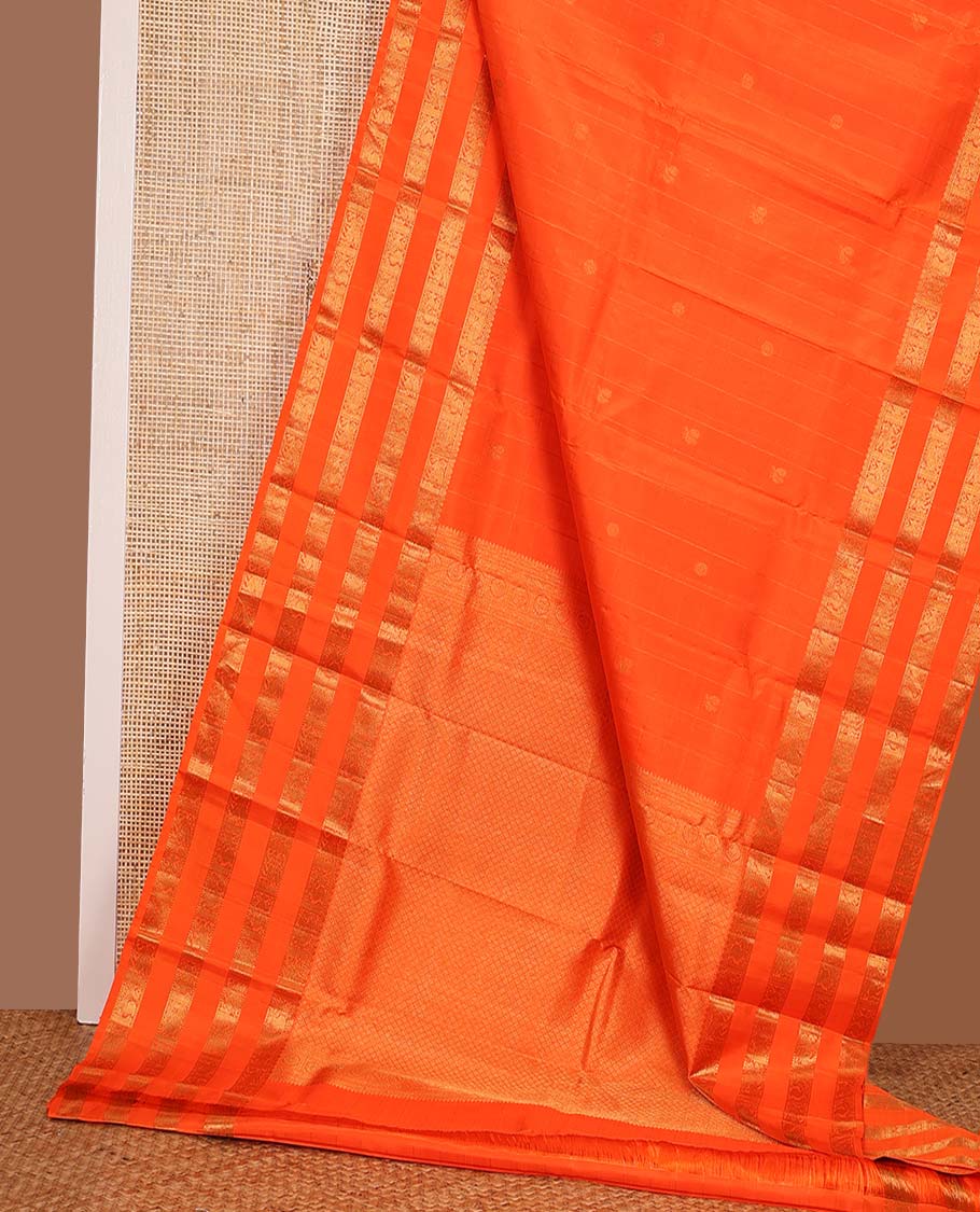 Orange zari buttas Kanchipuram silks saree, zari border of thilakam, muthu, yaanai, mayil, and kuthirai, and jaal pallu