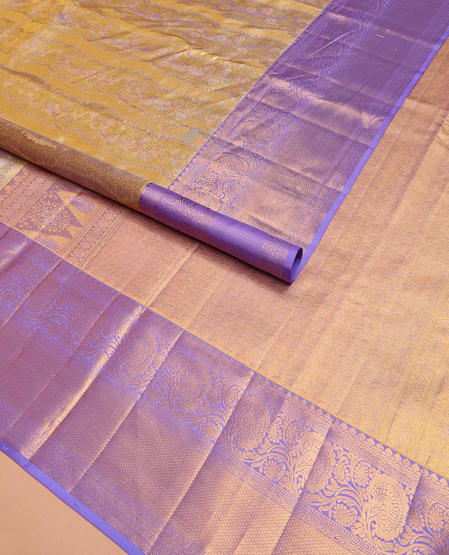 Yellow Kanchipuram Tissue Silk Saree, Embellished with Jacquard Design on Its Body, Complemented by a Contrast Border of Thilakam, Muthu, Kodi Visiry, Laddu Kamalam, and Mayil Kann Designs, Meticulously Crafted Pallu, and Paired with a Contrast Blouse