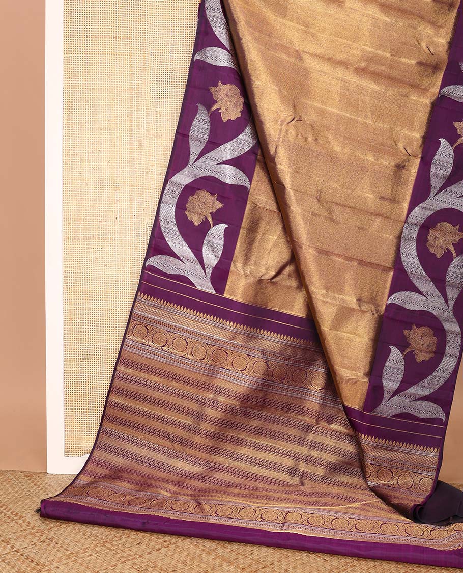 Antique gold Kanchipuram silk saree, contrast floral creeper zari border, and pallu of muthu, banaras, vanki, manga, and kodi visiry designs