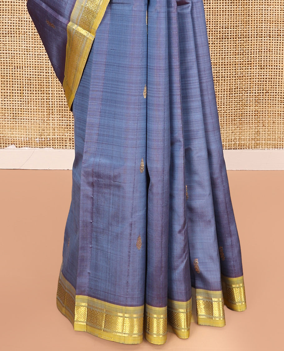 Grey Kanchipuram Silk Saree, Featuring Zari Buttas All Over Its Body, Complemented by a Contrast One-Sided Border of Banaras, and Mayil Kann Designs, Pallu of Zari Designs, and Comes Without a Blouse