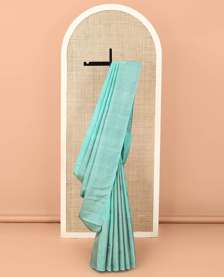 Borderless turquoise mayil and floral design Kanchipuram designer saree, zari-rich jaal pallu