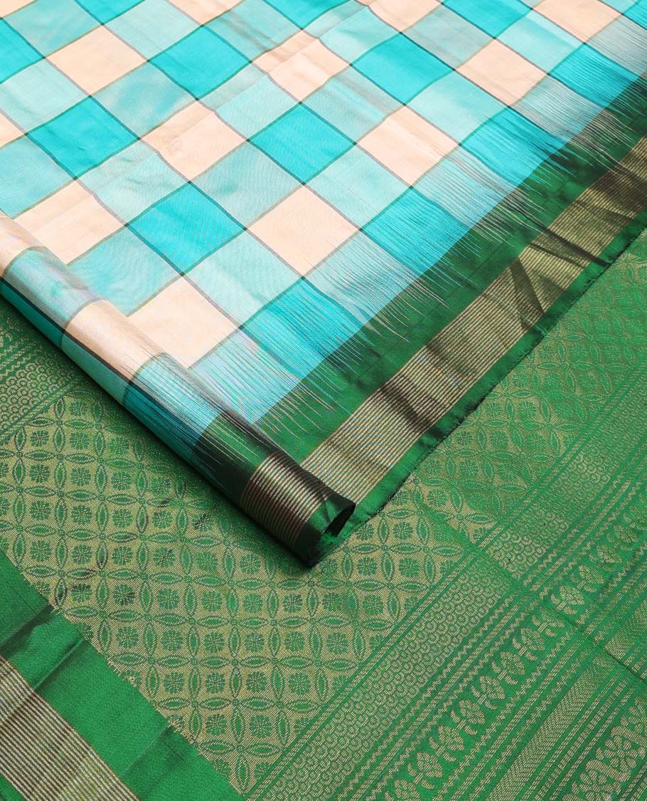 Multi-color bold checked soft silk saree, contrast Vaira Oosi border, and pallu of geometric patterns