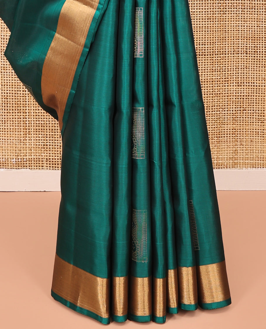 Green Mayuri Soft Silk Saree, Embellished with Buttas All Over the Body, Highlighted by a Zari Bavanji Border, Contrast Intricately Designed Pallu, and Paired with a Contrast Blouse