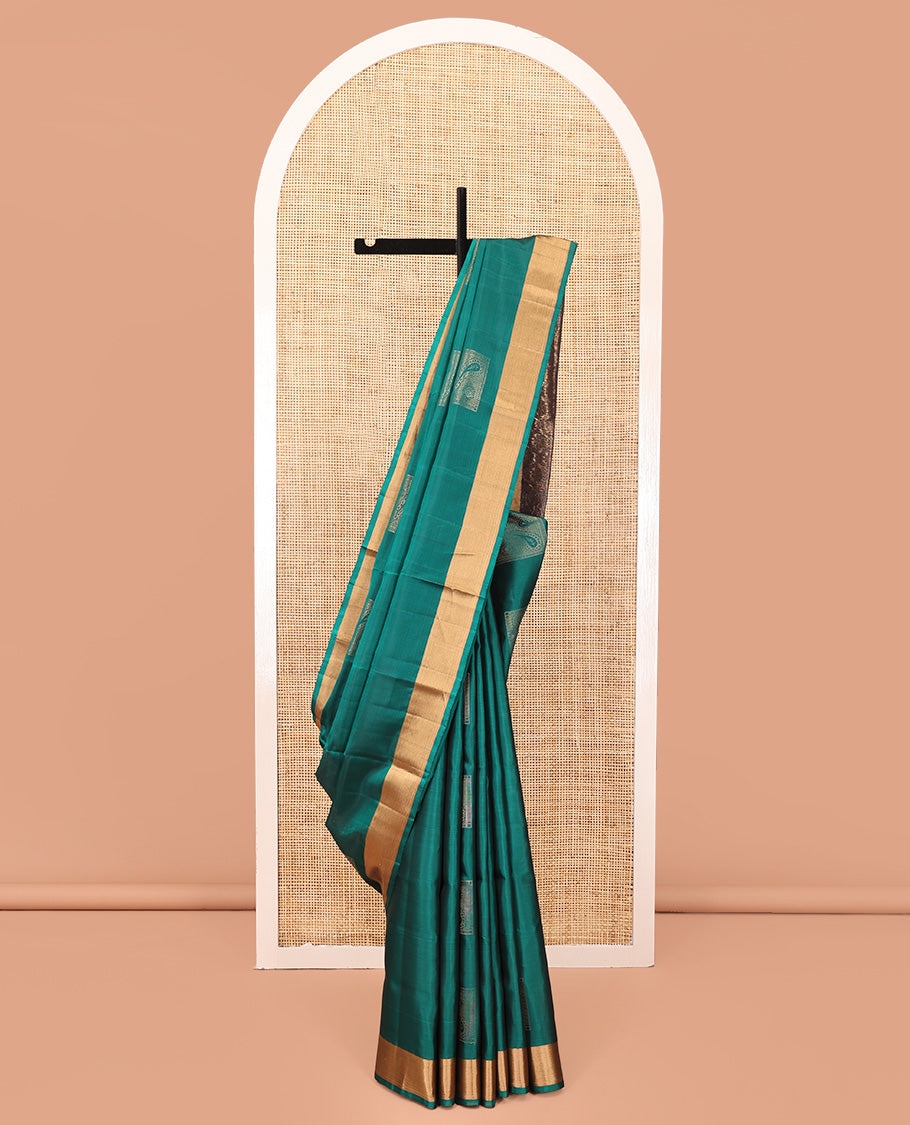 Green Mayuri Soft Silk Saree, Embellished with Buttas All Over the Body, Highlighted by a Zari Bavanji Border, Contrast Intricately Designed Pallu, and Paired with a Contrast Blouse