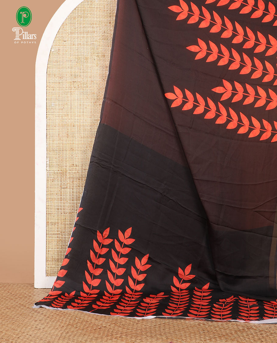 Borderless black half-half style crepe silk saree printed with orange color leaf vine design, leaf motifs printed blouse