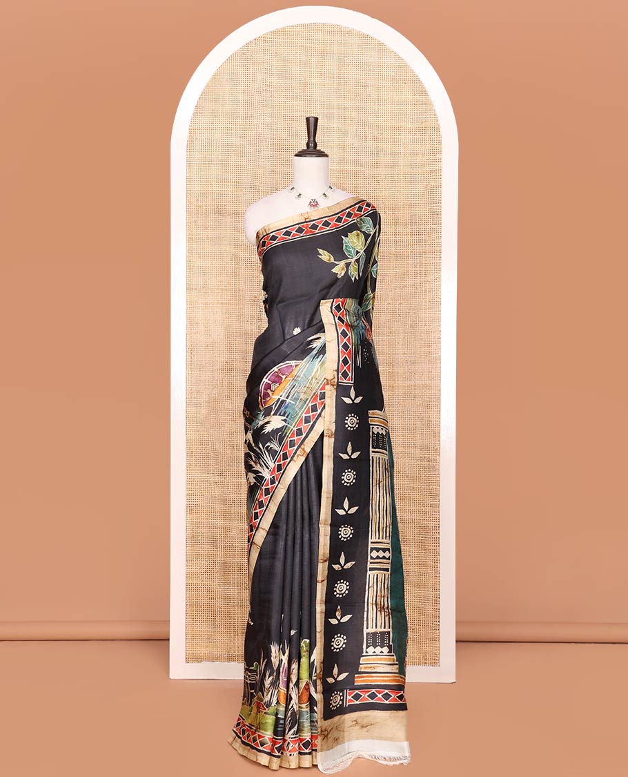 Black Printed Silk Saree Adorned with Colorful Floral Motifs Printed All Across Its Body, Highlighted with a Contrast Geometric Printed Border, Pallu Depicting the Darwing of Goddess Durga Killing Mahishasura, and Attached with a Printed Blouse