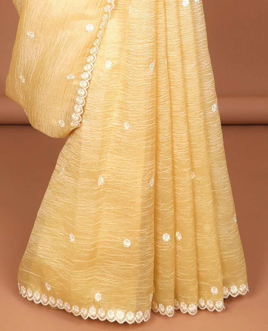 Light yellow floral thread embroidery tissue saree with floral scallop thread embroidery border