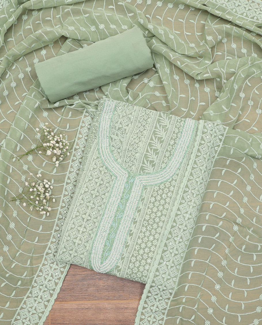 Pista Green Material Chudidar Set, Bedecked with Chikankari-Style Embroidery and Neck Work on Georgette Top, a Plain Santoon Bottom, and Paired with a Floral Vine Embroidery Georgette Dupatta
