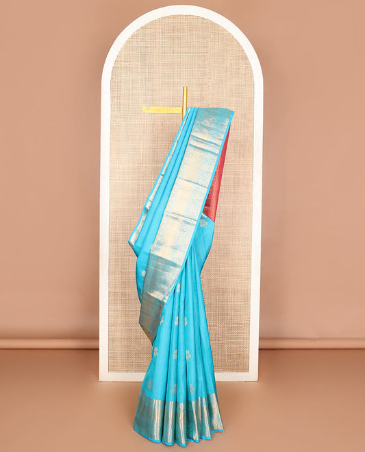 Blue zari buttas & striped Vasundhara silk mix saree, zari border of thilakam, rudraksham, cross kamalam & manga & contrast jaal pallu