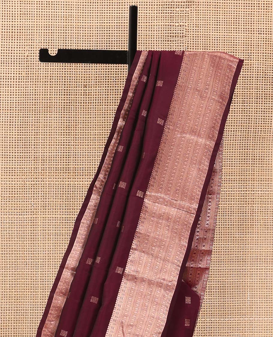 Maroon zari buttas Vasundhara silk mix saree, zari border of thilakam mokku, kathir, and rudraksham designs, and jaal pallu