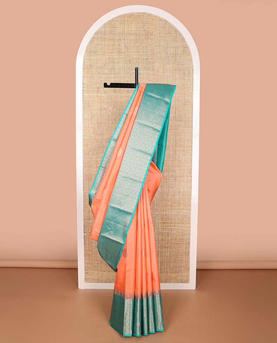 Peach buttas silk saree with contrast border of temple, floral design & floral jaal pallu
