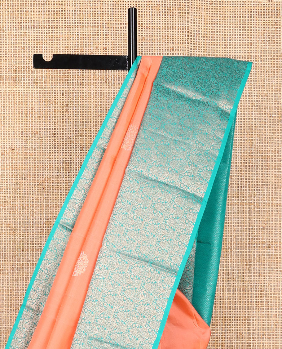 Peach buttas silk saree with contrast border of temple, floral design & floral jaal pallu