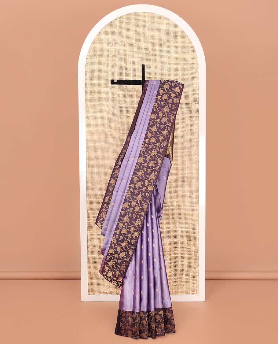Lavender Vasundhara Silk Saree, Ornamented with Zari Buttas on Its Body, Complemented by Contrast Zari Border of Floral Jaal Designs, Gracefully Embellished Pallu of Floral Jaal Designs, and Paired with a Contrast Blouse