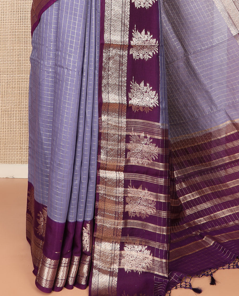 Grey Assam Silk Saree Beautifully Bedecked with Zari Checks, Complemented by Contrast Traditional Zari Border of Floral Designs, a Captivating Pallu of Zari Stripes, and Paired with a Contrast Blouse