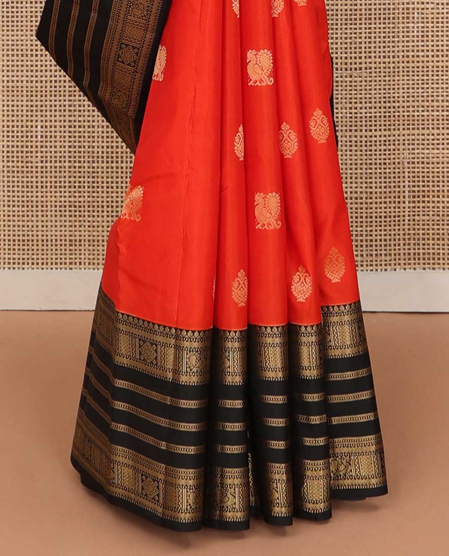 Orange zari buttas silk saree, contrast border of thilakam, Muthu, kathir, mayil kann and  mayil designs and geometric patterned pallu
