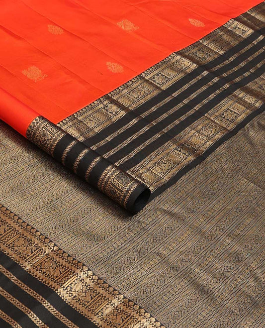 Orange zari buttas silk saree, contrast border of thilakam, Muthu, kathir, mayil kann and  mayil designs and geometric patterned pallu