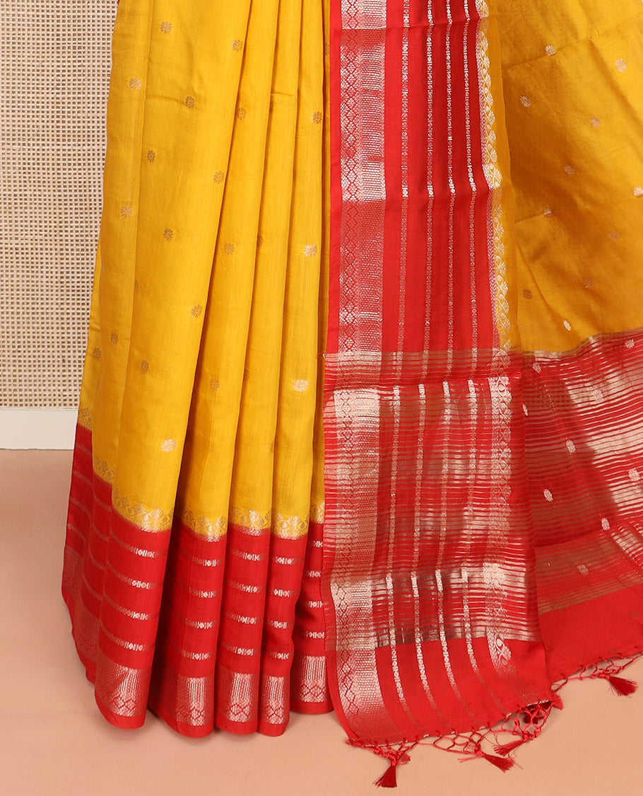Yellow floral buttas Assam silk saree, contrast traditional zari design border, and pallu of zari stripes