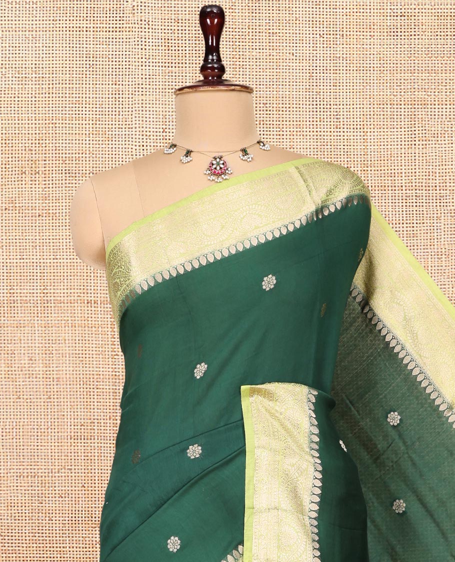 Green Assam Silk Saree, Bedecked with Zari Buttas, Complemented by a Contrast Zari Traditional Border, Zari-Striped Pallu, and a Contrast Blouse