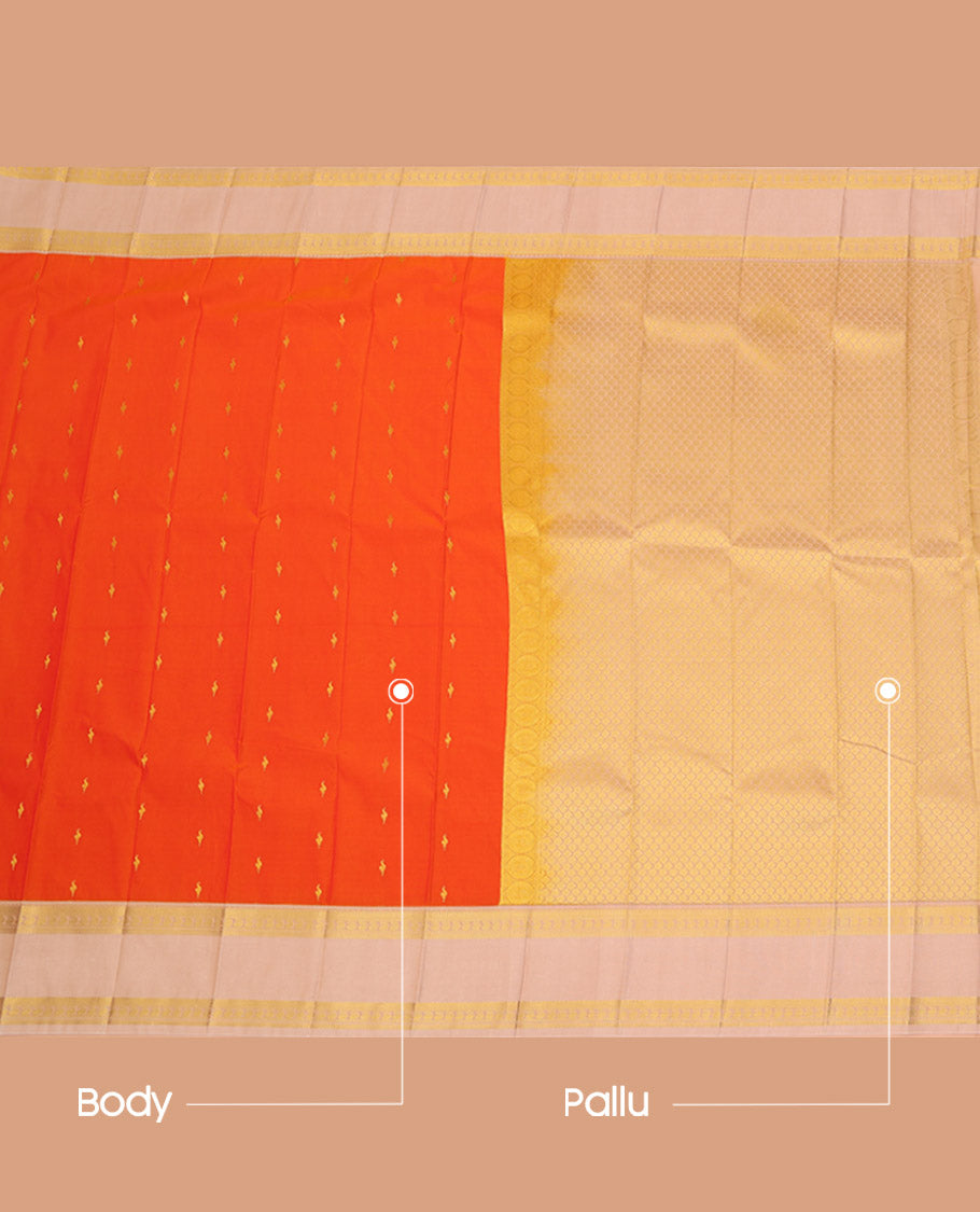 Orange Budget Silk Saree Adorned with Zari Buttas, Highlighted with a Contrast Traditional Zari Design Rettai Pettu Border, Subtle Pallu of Jaal Design, and Paired with a Contrast Blouse