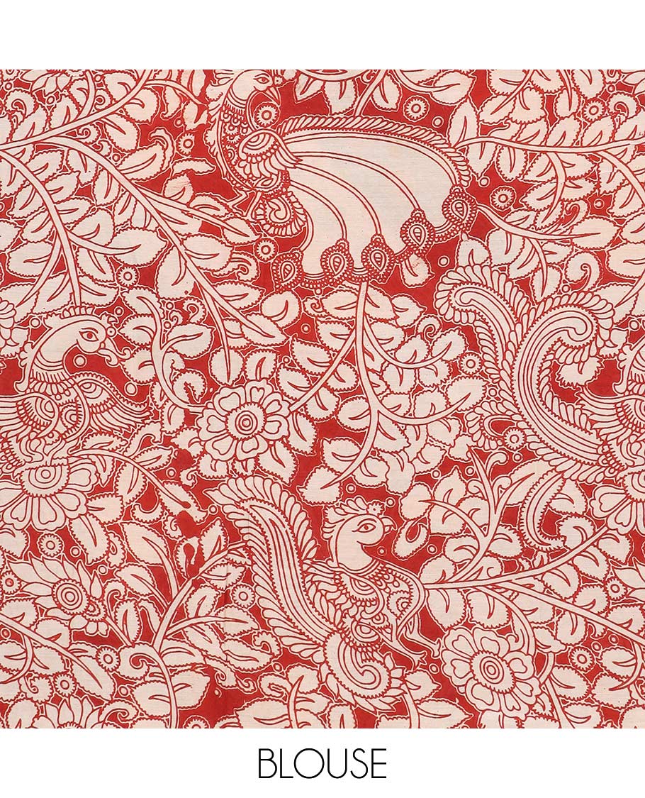 Cream floral and bird machine printed kalamkari cotton saree, contrast floral printed border, and rangoli style motifs pallu