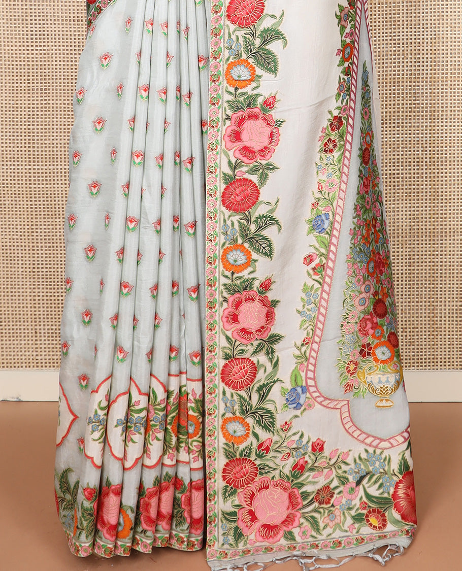 Cream and pastel blue floral buttas dola silk saree, colorful floral design steeped border, and pallu