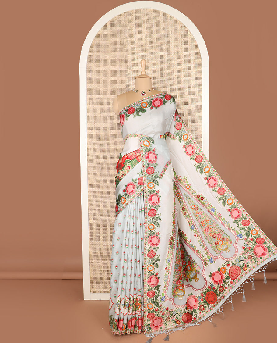 Cream and pastel blue floral buttas dola silk saree, colorful floral design steeped border, and pallu