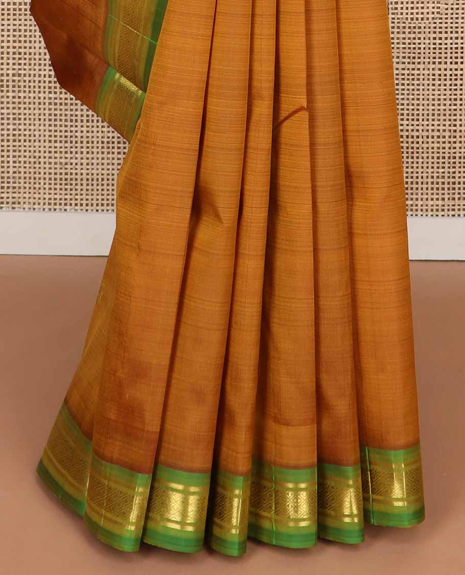 Brown buttas kancheepuram silk saree with contrast zari design border & zari design pallu