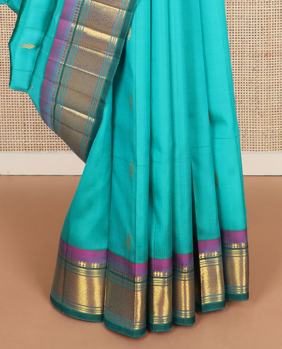 Blue zari buttas kanchipuram silksaree, contrast one-sided border of paneer sombu,banaras,muthu & jaal design & zari design pallu