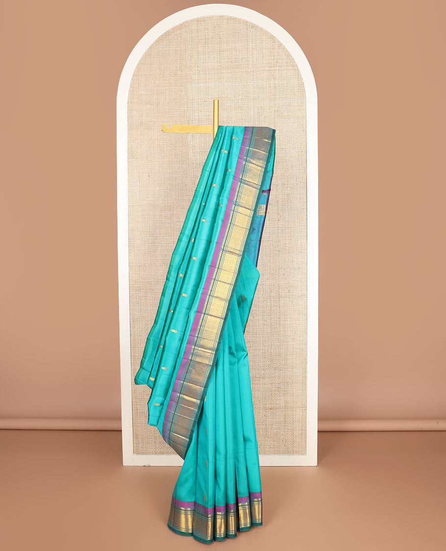 Blue zari buttas kanchipuram silksaree, contrast one-sided border of paneer sombu,banaras,muthu & jaal design & zari design pallu