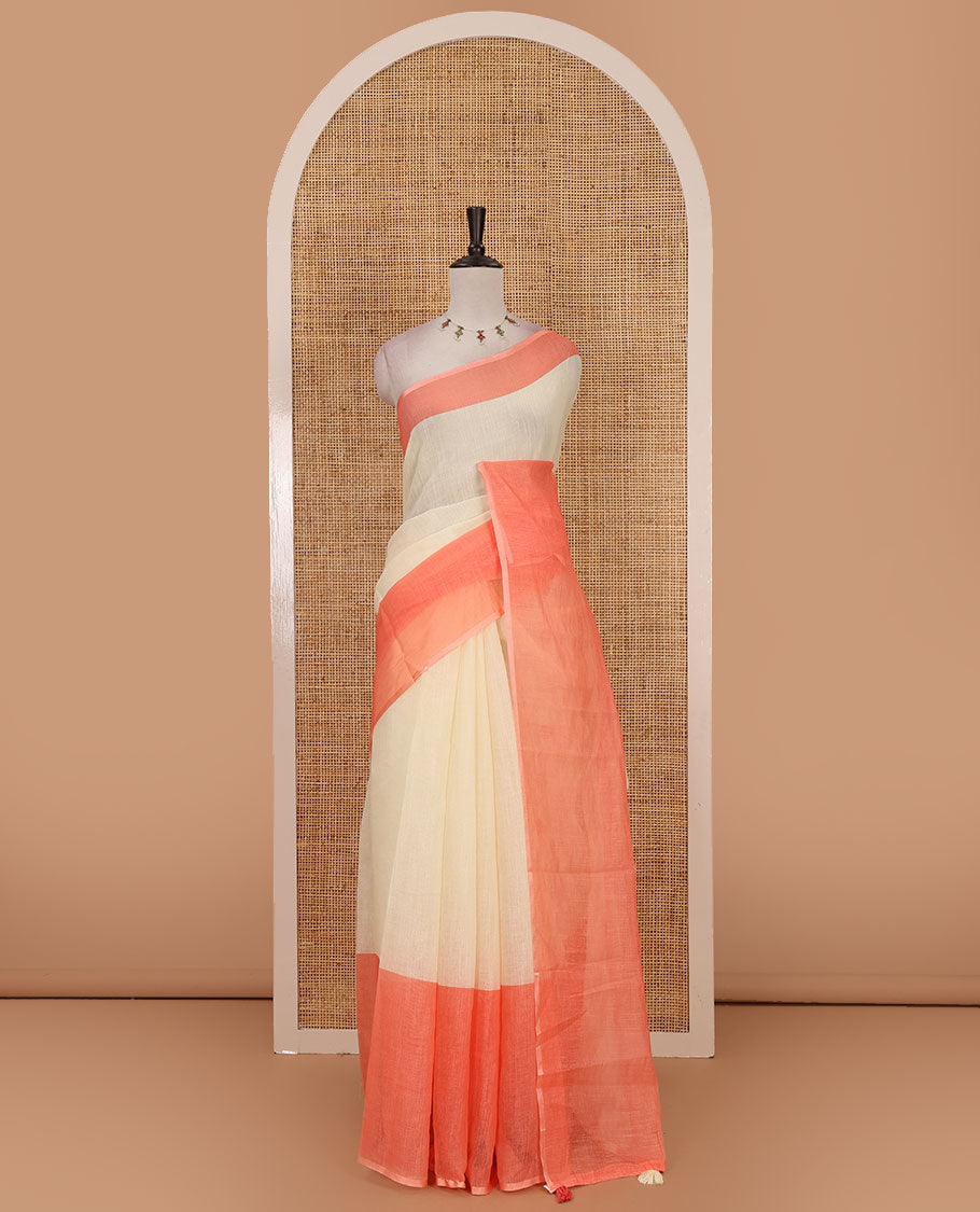 Cream full-plain linen saree, contrast big plain pink border & plain pallu & buttas printed matching blouse