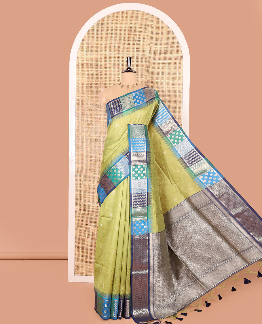 Green Semi-Raw Silk Saree, Adorned with Buttas All Over Its Body, Complemented by Contrast Meenakari-Style Woven Border of Geometric Zari Designs, Majestically Detailed Pallu, and Paired with a Contrast Blouse