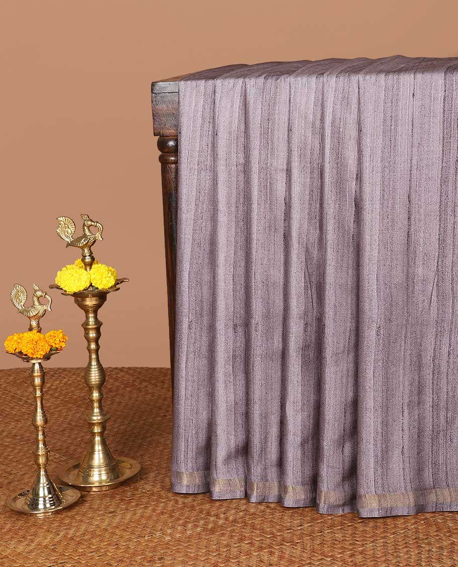 Grey semi kicha tussar saree with small zari border & kalamkari pallu along with floral printed blouse