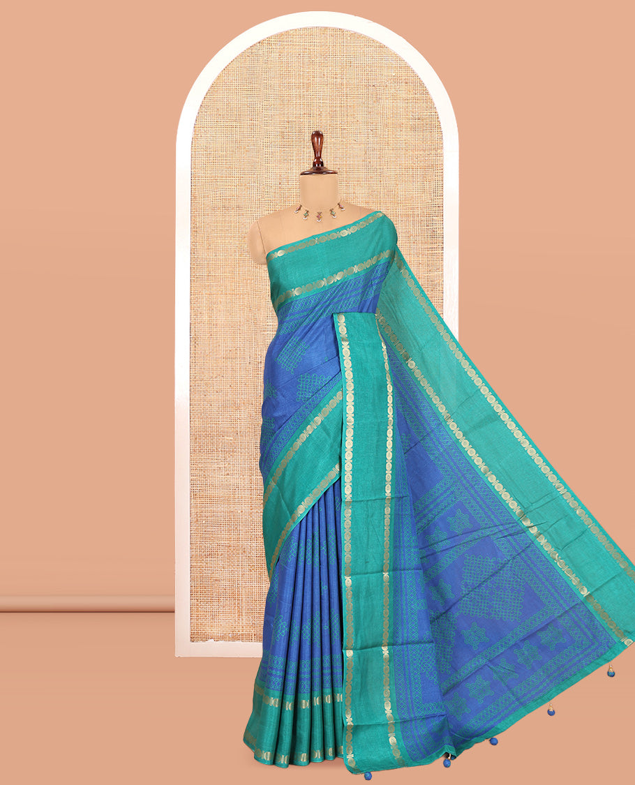 Blue Art Tussar Saree, Adorned with Kolam Buttas, a Contrast Rettai Pettu Rudraksham Border, Kolam Pallu, and a Contrast Blouse
