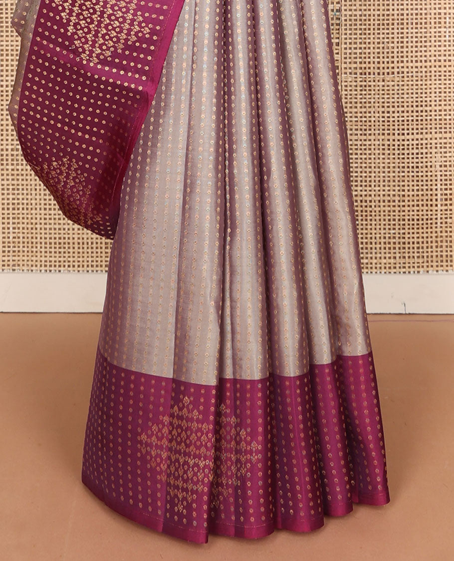 Grey vasundhara elite silk saree with zari buttas, contrast border of zari designs & pallu of manga & jaal designs