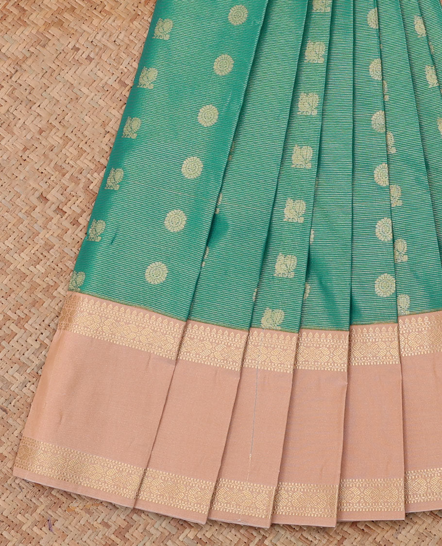 Green Budget Silk Saree, Artfully Detailed with Stripes and Peacock-Chakram Buttas, a Contrast Traditional Zari Rettai Pettu Border, Sparsely Woven Pallu, and a Contrast Blouse