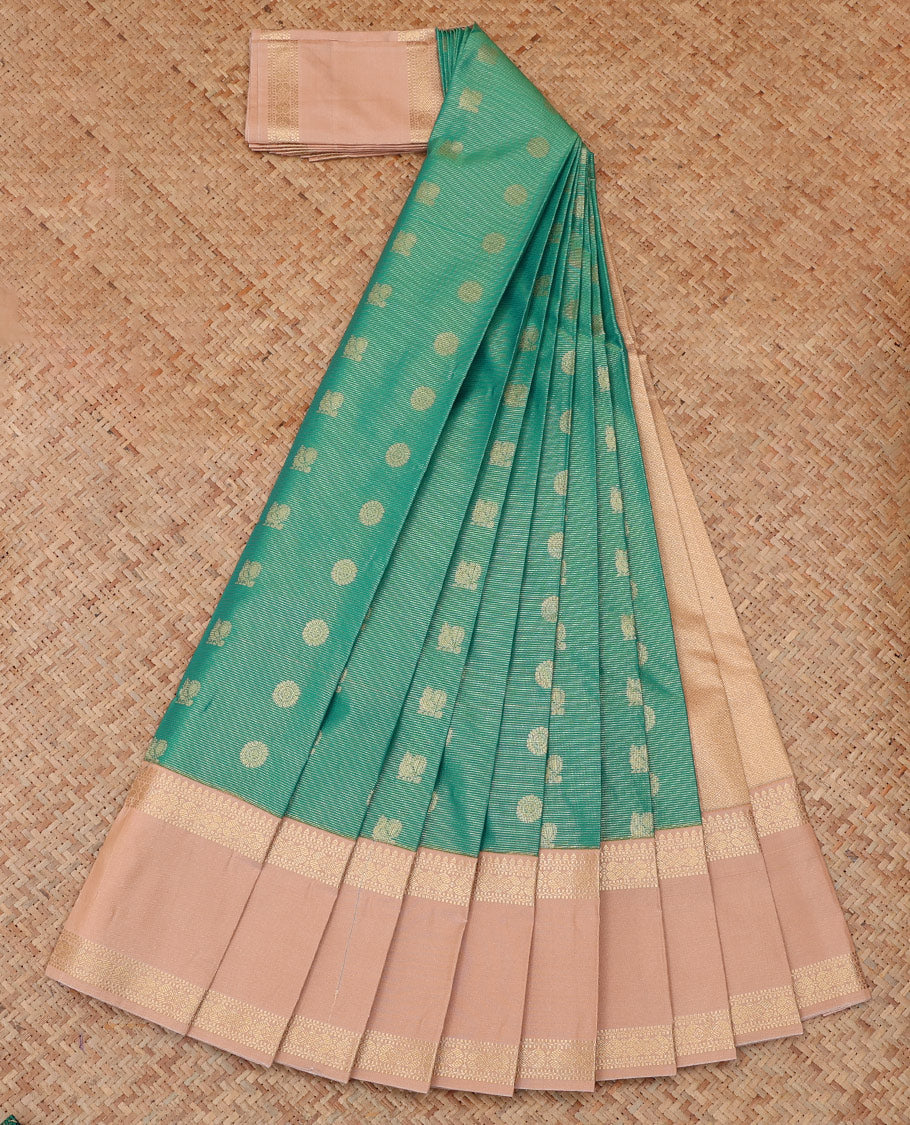 Green Budget Silk Saree, Artfully Detailed with Stripes and Peacock-Chakram Buttas, a Contrast Traditional Zari Rettai Pettu Border, Sparsely Woven Pallu, and a Contrast Blouse