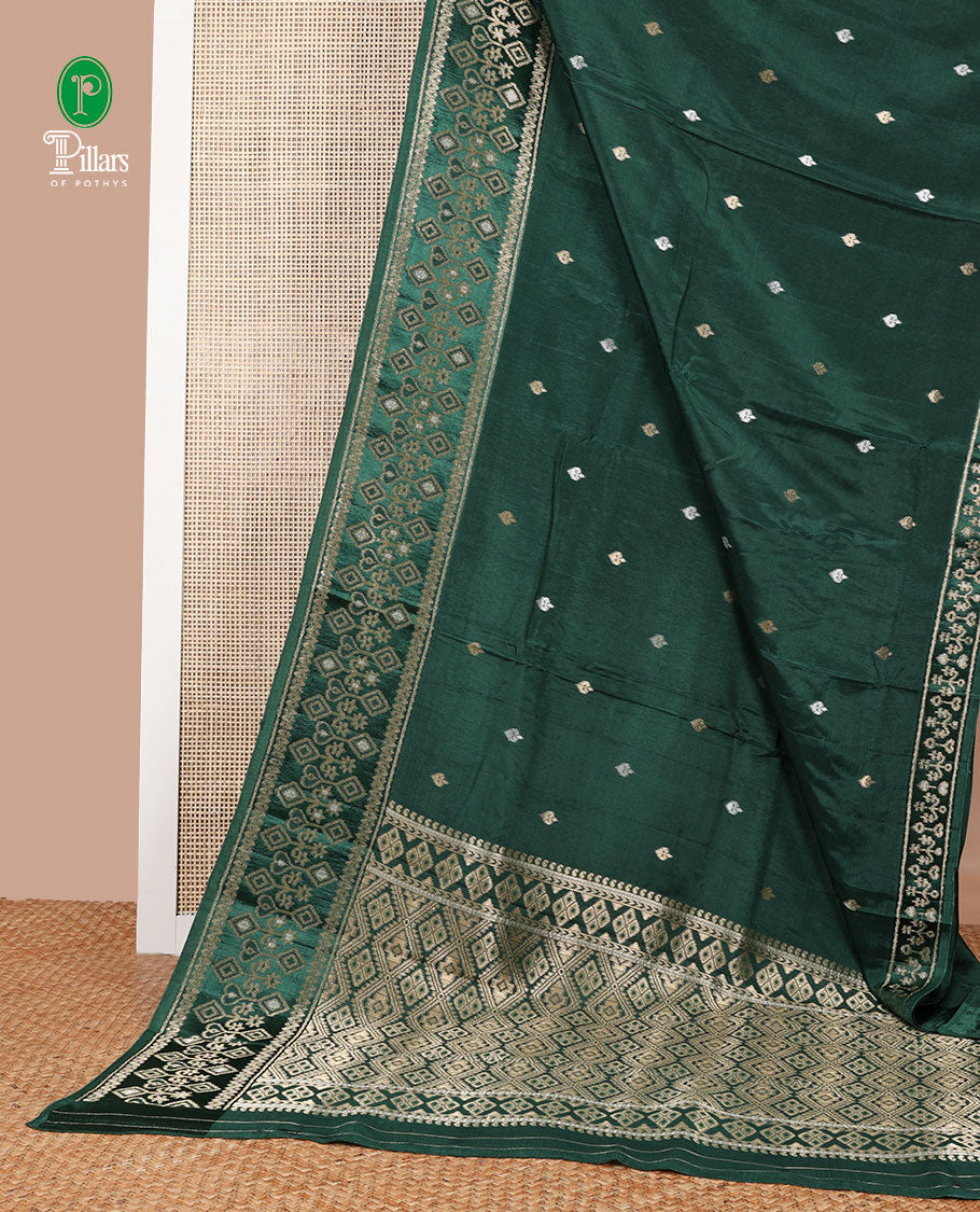 Bottle green patola style zari butta dola silk saree with patola zari design border & rich pallu along with plain blouse