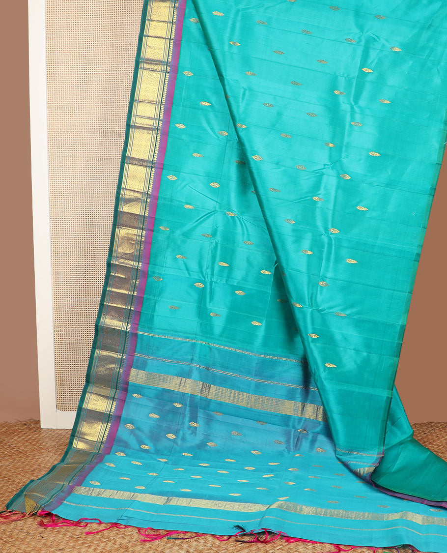 Blue zari buttas kanchipuram silksaree, contrast one-sided border of paneer sombu,banaras,muthu & jaal design & zari design pallu