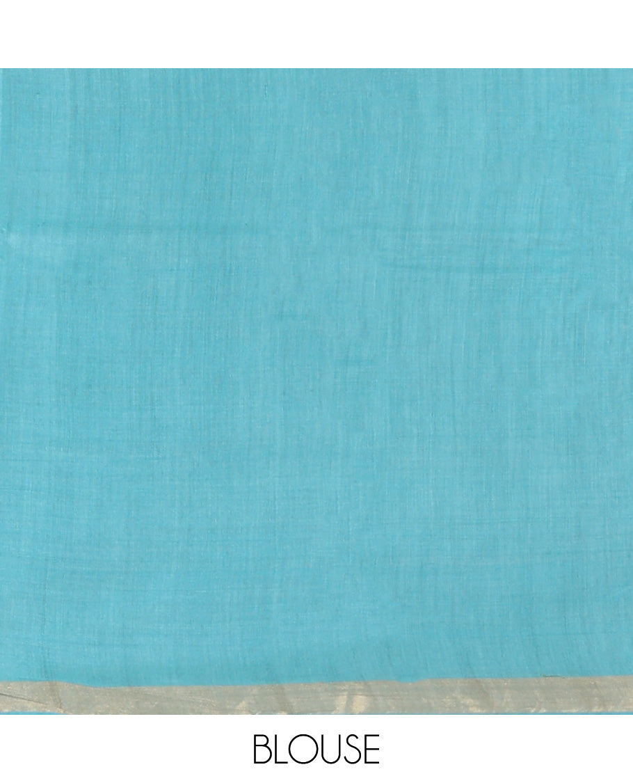 Blue Tussar Saree, Bedecked with Buttas, a Subtle Zari Border, Pallu of Intricate Designs, and a Matching Blouse
