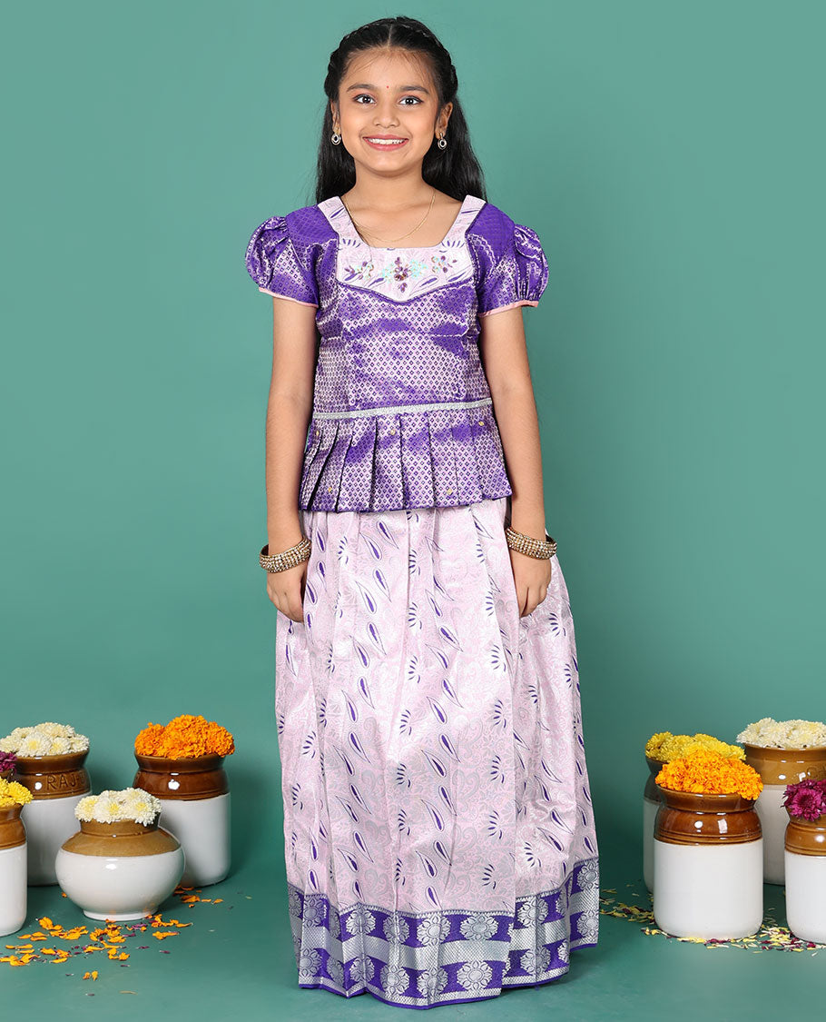 Baby pink readymade art silk pavadai, meenakari jacquard & contrast chakram zari border skirt, and contrast jacquard embroidered puff-sleeve blouse