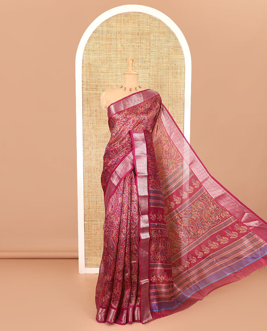 Magenta paisley motifs printed green silk saree, traditional zari border, paisley printed pallu, and a matching blouse