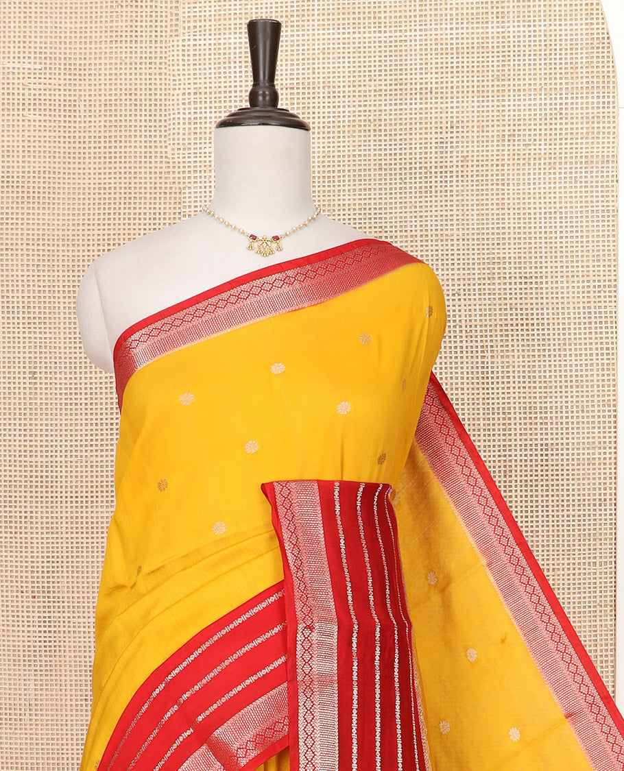 Yellow Assam Silk Saree Graced with Floral Zari Buttas, Complemented by a Contrast Traditional Zari Border, a Captivating Pallu of Zari Designs, and Paired with a Contrast Blouse